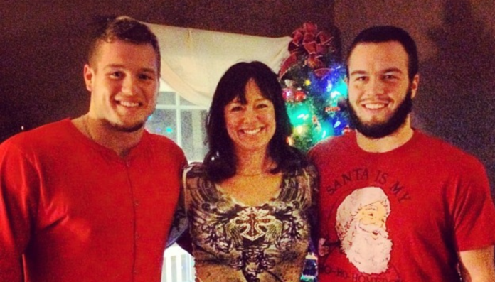 Colton With His Brother And Mother During The 2013 Christmas