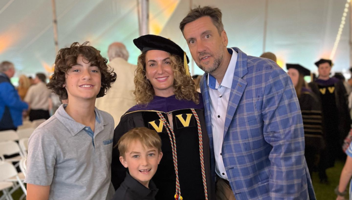 Lara Travis With Her Husband And Kids During Her Graduation